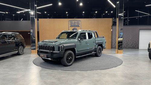 Kia Tasman 2025 хаки